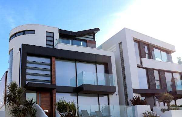 Modern building exterior with glass balconies